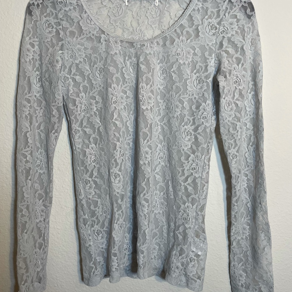 Lace top. No tags inside shirt. Approx sz S/M
